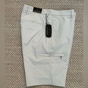 Men’s Greg Norman Golf Shorts.  Size 34.  New with tags